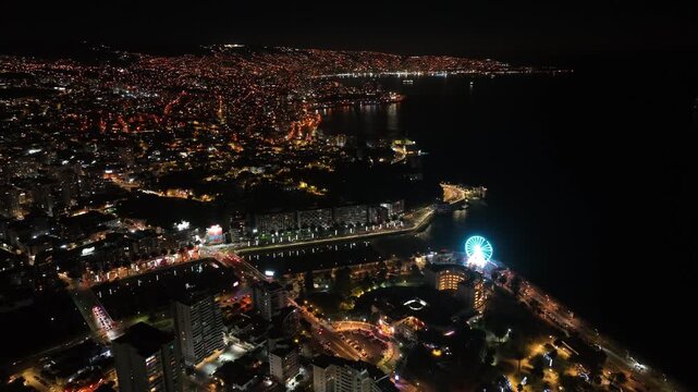 Aerial View of Illuminated Ferris Wheel at Night in Vina del Mar, Chile