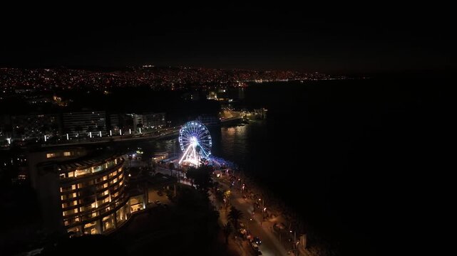 Aerial View of Illuminated Ferris Wheel at Night in Vina del Mar, Chile