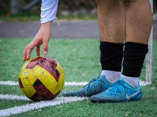 soccer player placing ball for a corner kick © Jonas