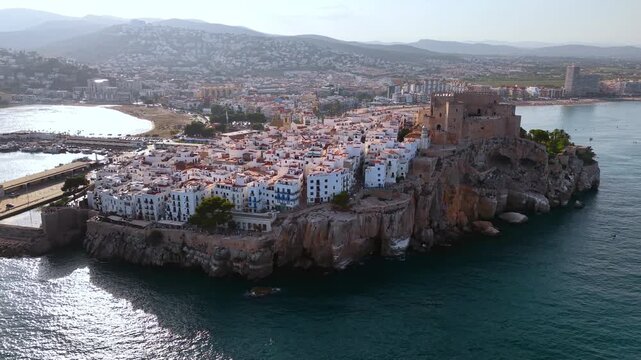 Drone view of Peniscola castle built on sea cliffs, Valencia region, Spain. High quality 4k footage