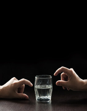 An optimist and a pessimist's opinion about a glass of water