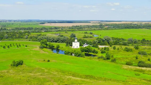Russia, Bogolyubovo. Drone footage of Church of the Intercession on the Nerl. Orthodox church and a symbol of medieval Russia. Drone footage, Point of interest