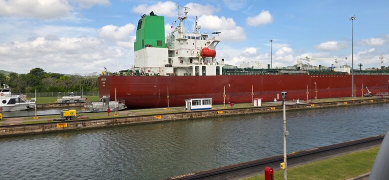 Panama Canal Electric Mule Locomotive Towing Cargo Ship Through Locks