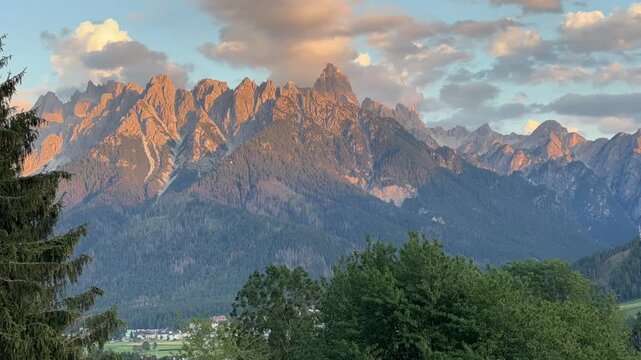 Time-lapse of dramatic clouds drifting over the breathtaking alpine landscape of the Puster Valley (Val Pusteria