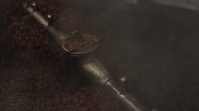Macro shot of aromatic coffee beans during the roasting process.