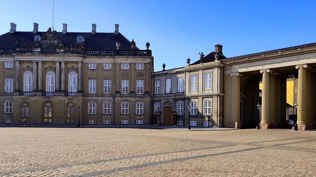 Exterior view of Christian IX&rsquo;s Palace, also known as Schack&rsquo;s Palace (Schacks Pal&aelig;), one of the four historic palaces comprising the renowned Amalienborg complex in Copenhagen, Denmark.