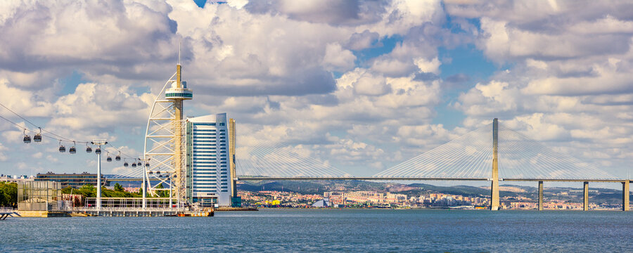 The modern Park of the Nations area in Lisbon with the Vasco Da Gama bridge and cable car, Portugal