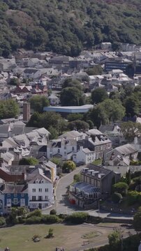 Vertical establishing aerial view of Bangor, city in the north of Wales, United Kingdom