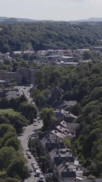 Vertical establishing aerial view of Bangor, city in the north of Wales, United Kingdom