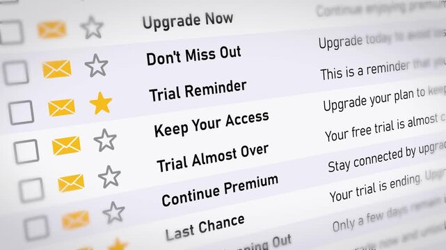 Close up of software trial expiration emails with upgrade now alerts