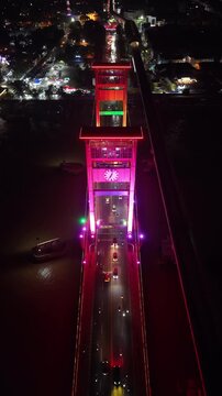 Aerial View of Ampera Bridge Landmark and Musi River in Palembang