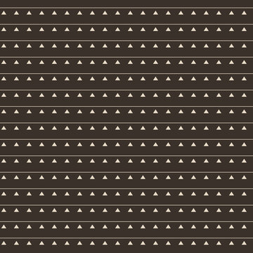 Seamless mudcloth tribal pattern in cream on dark brown