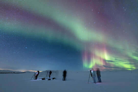 Photographers taking photos of auroras