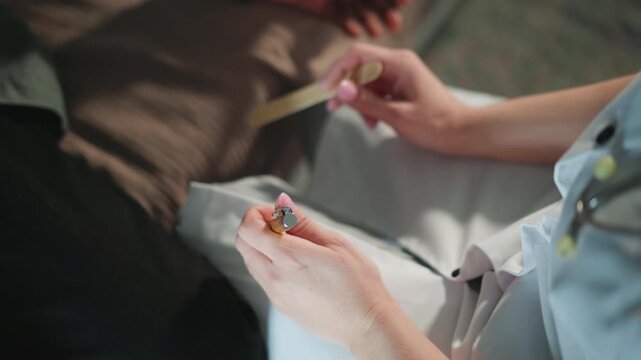 Caucasian paramedic preparing autoinjector at bedside, calm home scene with steady hands, cap removal and dosage check, soft natural light, clinical uniform, patient reassurance and focused emergency