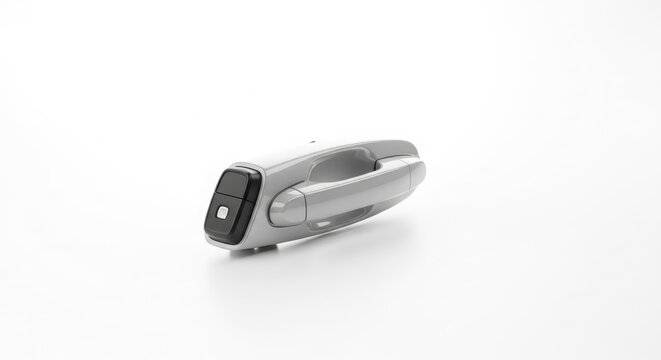 Modern silver car door handle featuring a sleek integrated electronic touch sensor isolated against a clean white background captured with sharp studio lighting for automotive