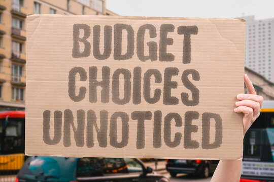 "Budget choices unnoticed" Living within limits means deciding what to sacrifice silently. BUDGET. CHOICE. SACRIFICE. INVISIBLE. LIMIT.