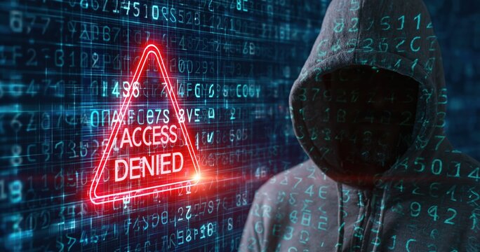 Hacker standing before a digital binary code wall representing a cyber crime threat