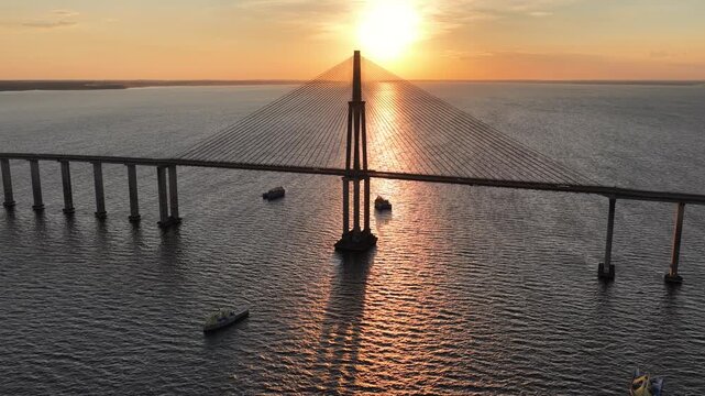 Phelippe Daou Bridge At Manaus In Amazonas Brazil. Sunrise Cable Bridge. Peaceful Landscape. Amazon Black River. Phelippe Daou Bridge In Manaus In Amazonas Brazil. Beautiful Sunset. Amazon Forest.