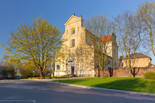 Historic church surrounded by trees on Saint Adalbert Hill in Poznan, Poland.