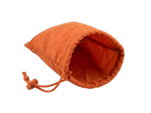 Empty orange fabric drawstring pouch for small items isolated on transparent background