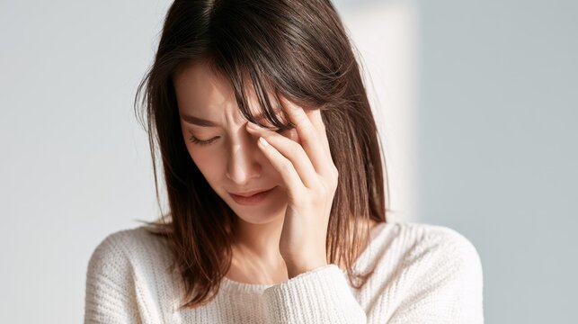 Asian Woman Pressing Eye Socket Sinus Pain Discomfort Bust Shot