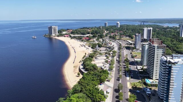 Ponta Negra Beach At Manaus In Amazonas Brazil. Highrise Buildings. Stunning Landscape. Coastline Riverfront. Ponta Negra Beach In Manaus In Amazonas Brazil. River Beach. Amazon Rainforest.