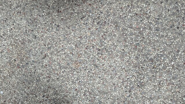 Seamless washed pebble aggregate concrete texture surface for background