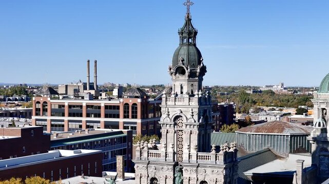 Aerial view of Eglise Saint Enfant Jesus and autumn cityscape in Montreal, Quebec, Canada. g.