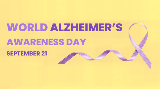 Purple ribbon lies on a soft yellow background to signify support and awareness for World Alzheimer's Day.
