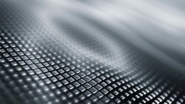 Abstract metallic chrome grid background with smooth wave motion and shallow depth of field creates dynamic industrial texture for futuristic video design.