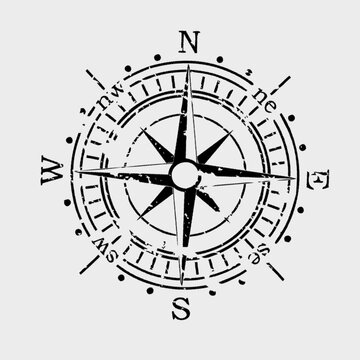 Compass rose vintage design illustration featuring distressed black ink textures on a plain light background surface