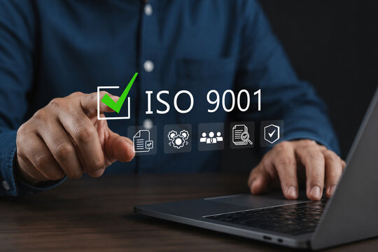 ISO 9001 Certification Concept. Businessman points to ISO 9001 with checkmark icons and quality control symbols, certification, Standard quality, certificate and standardization in quality management.
