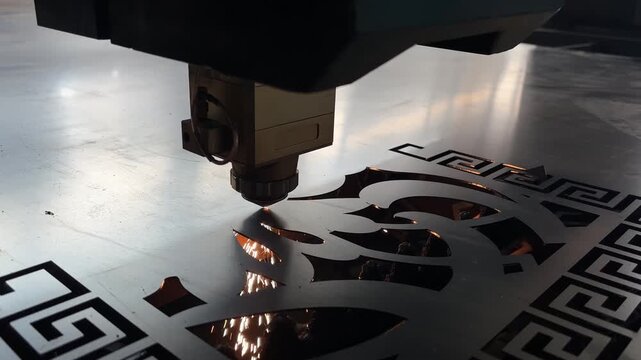 Industrial Laser Cutting Machine Cutting a Metal Sheet with Precision