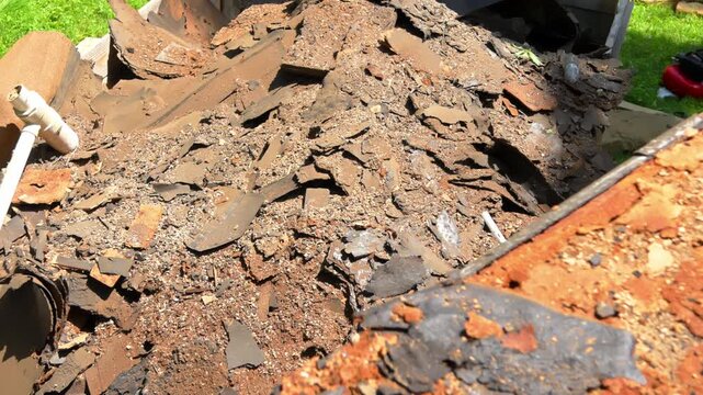 Building demolition debris during repair renovation process