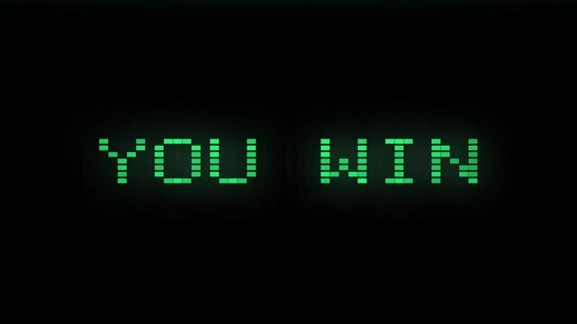 Green YOU WIN pixel text on black background, representing video game victory, success, achievement, and gaming win motion graphic.