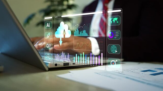 Holographic data cloud business graph chart on the screen, Business person using a laptop with a glowing hologram cloud dashboard, charts and app icons overlay 