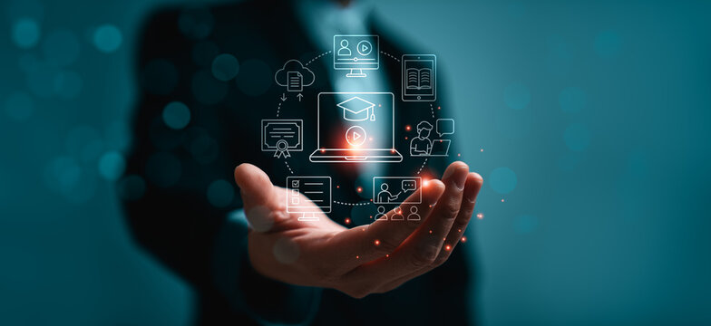 Online education e learning concept with business professional holding virtual digital course interface showing graduation laptop video lesson certificate and remote training icons