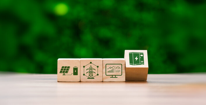 Smart grid and battery storage concept with wooden blocks showing solar power battery energy network analytics dashboard and power cabinet for sustainable electricity infrastructure
