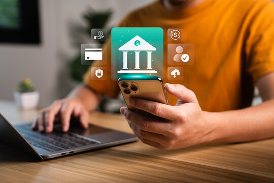 Mobile banking concept with person holding smartphone and virtual bank interface showing digital payment security user verification online transfer and financial service technology