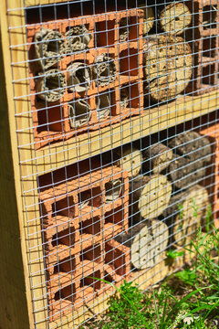 Wooden insect house for bees and garden life