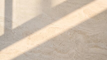 Obraz premium Warm sunlight falling across a natural travertine stone surface with porous texture, soft shadows, and earthy neutral tones for architectural and material concepts.