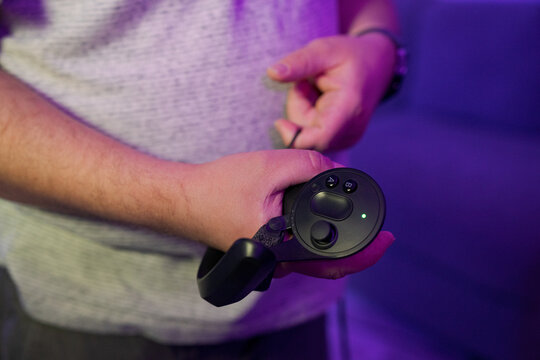 Close up of VR controller in users hand