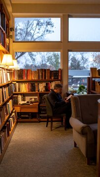 Cozy Reading Nook with Bookshelves and Natural Light.