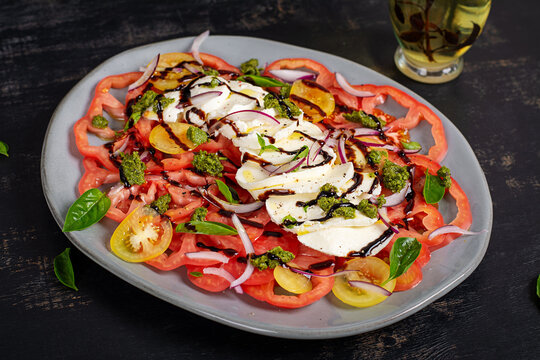 Mediterranean Tomato and Mozzarella Salad on Dark Background