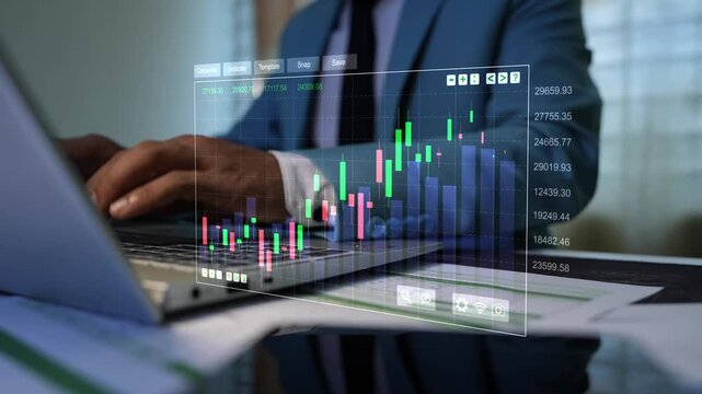 Business professional typing on a laptop with a transparent stock market chart overlay, Holographic business finance data, trading activity and digital analysis in a modern office 