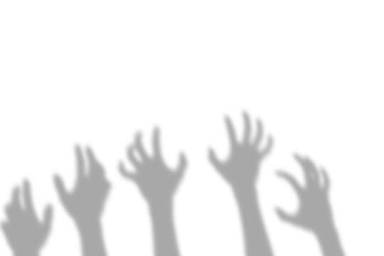 Creepy shadow of multiple human hands reaching upwards in a scary gesture presented as an isolated object on a transparent background isolated on transparent background