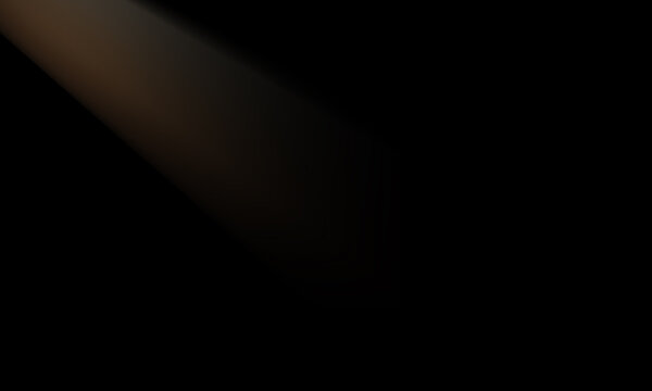 Abstract background with a soft diagonal beam of warm light emerging from a deep black void