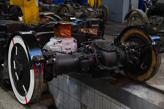 Tram wheel set in a repair workshop.