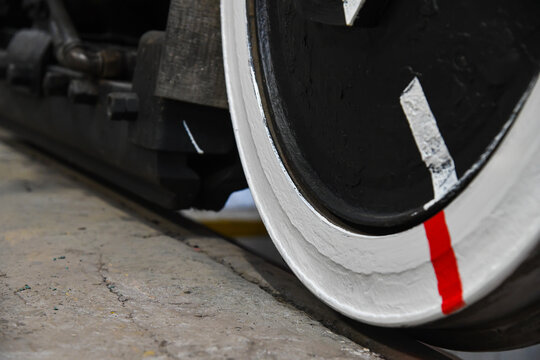Tram wheel set in a repair workshop.