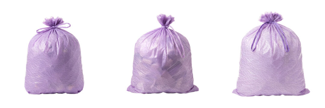 set of the high resolution  purple-toned drawstring and tied trash bags on withe background PNG photo stock''